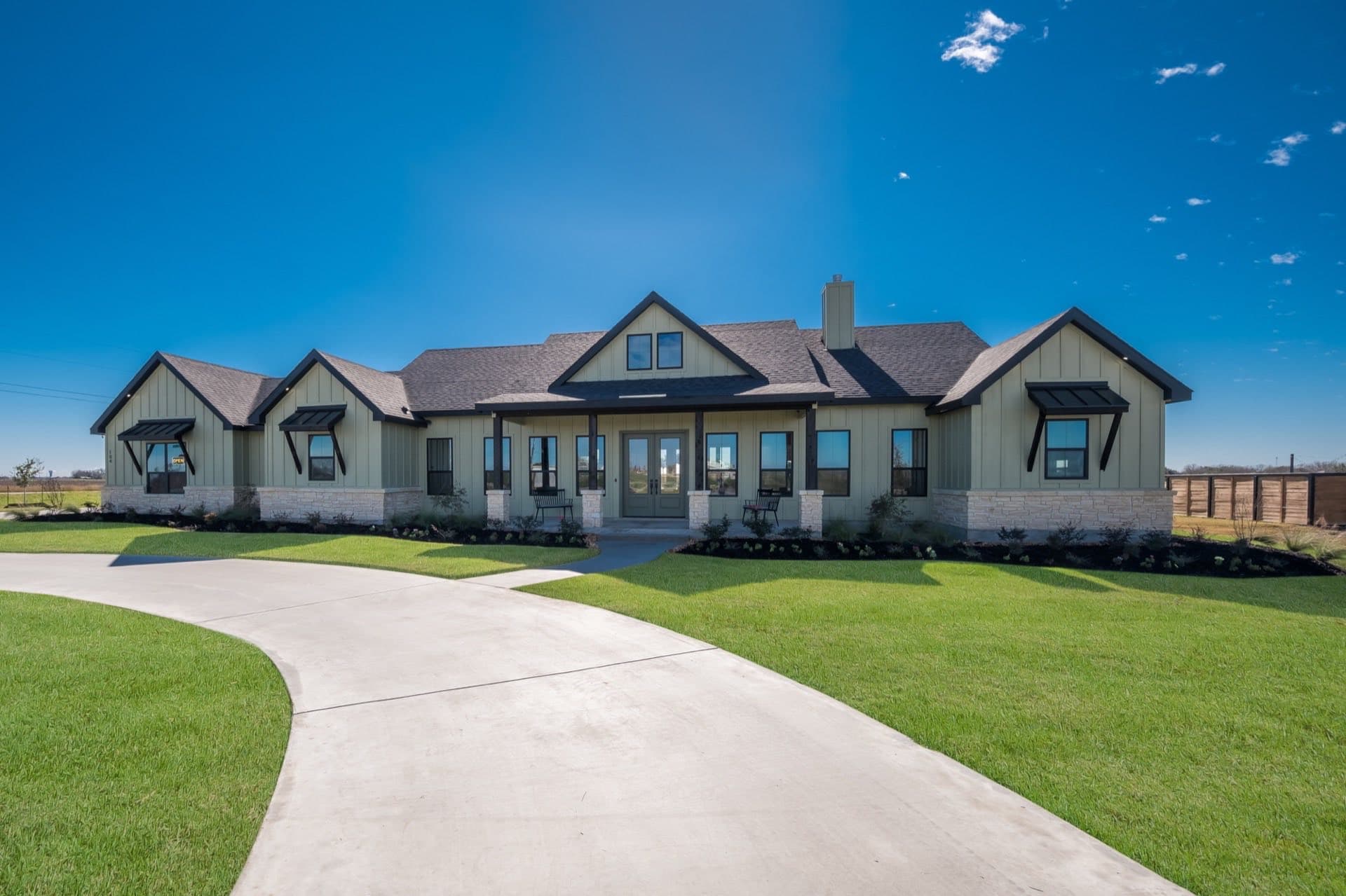Custom home exterior by TKG Custom Homes in the Texas Hill Country