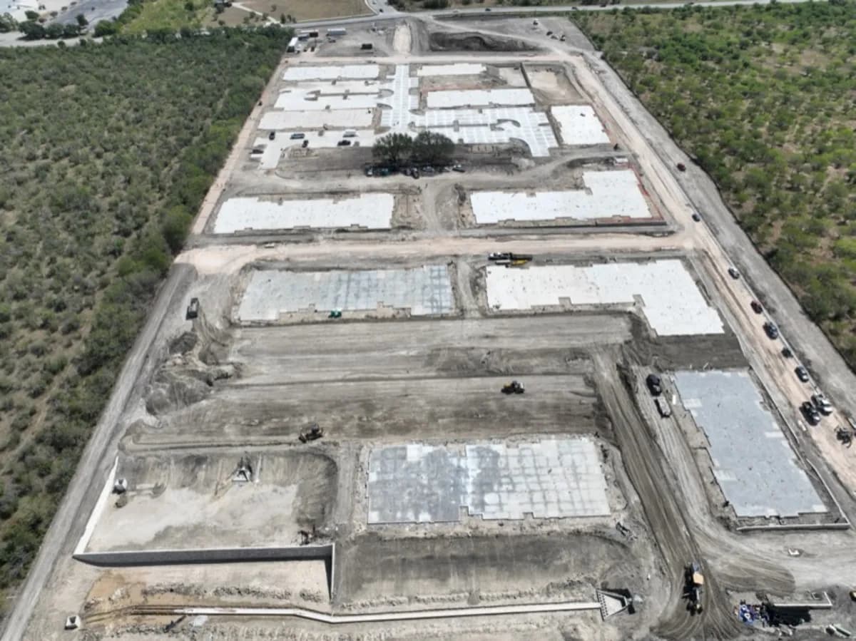 Aerial view of a commercial concrete project by Presidio Concrete, slabs poured across the site
