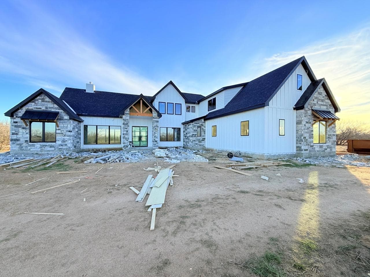 A custom home under construction on a TKG Custom Homes jobsite